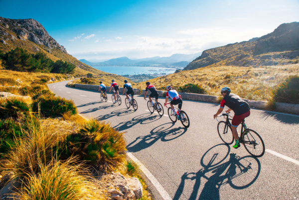 cycling team on a mountain road